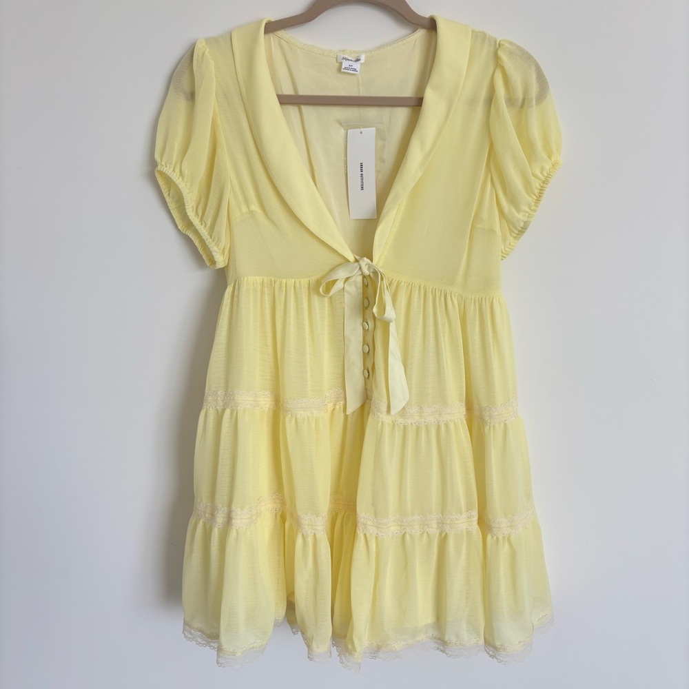 NWT Kimchi Blue Edie Embroidered Lace
Trim Babydoll Romper